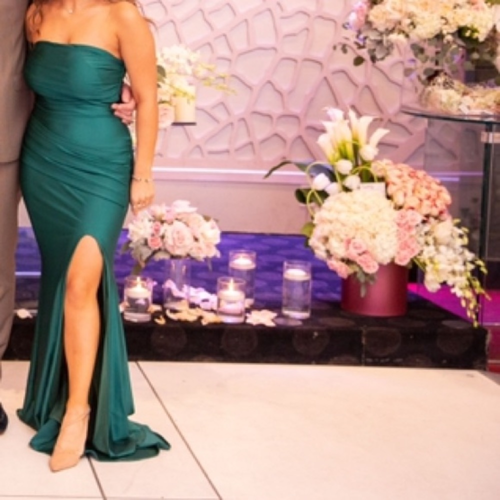 One shoulder, tight emerald green dress